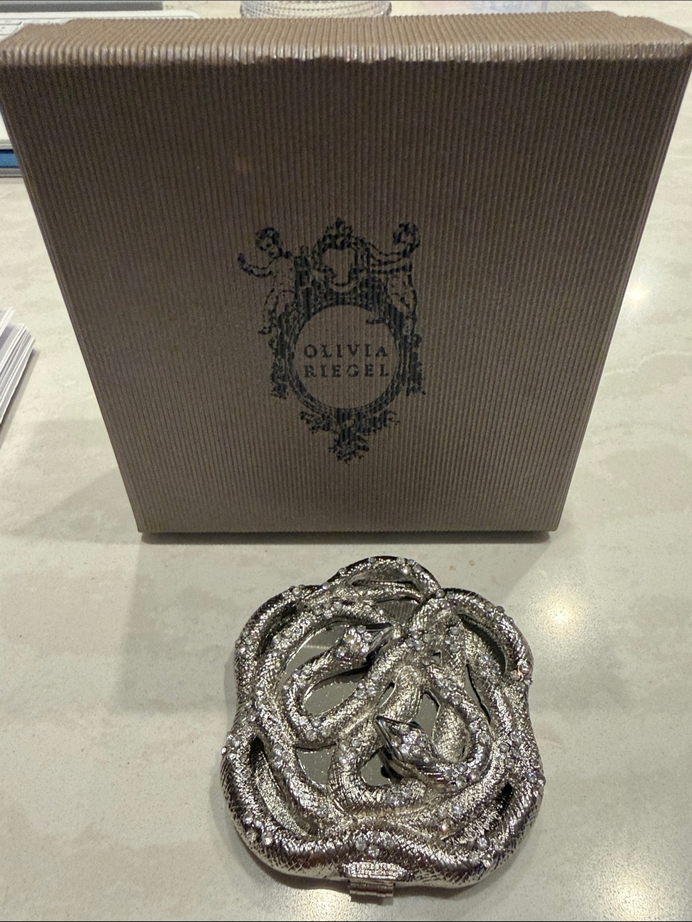 Olivia Riegel Silver Textured Metallic Compact